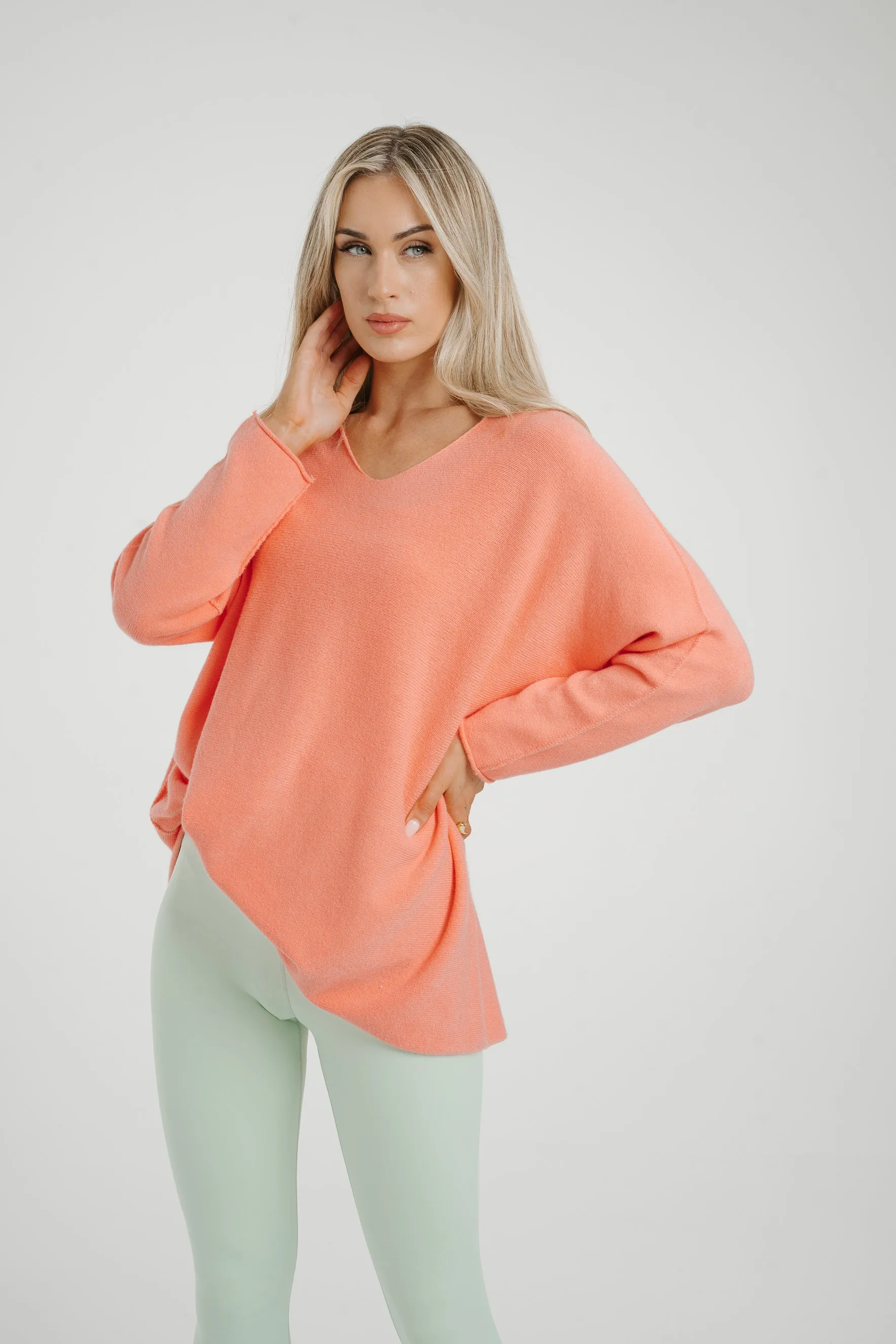 Amber V-Neck Jumper In Coral