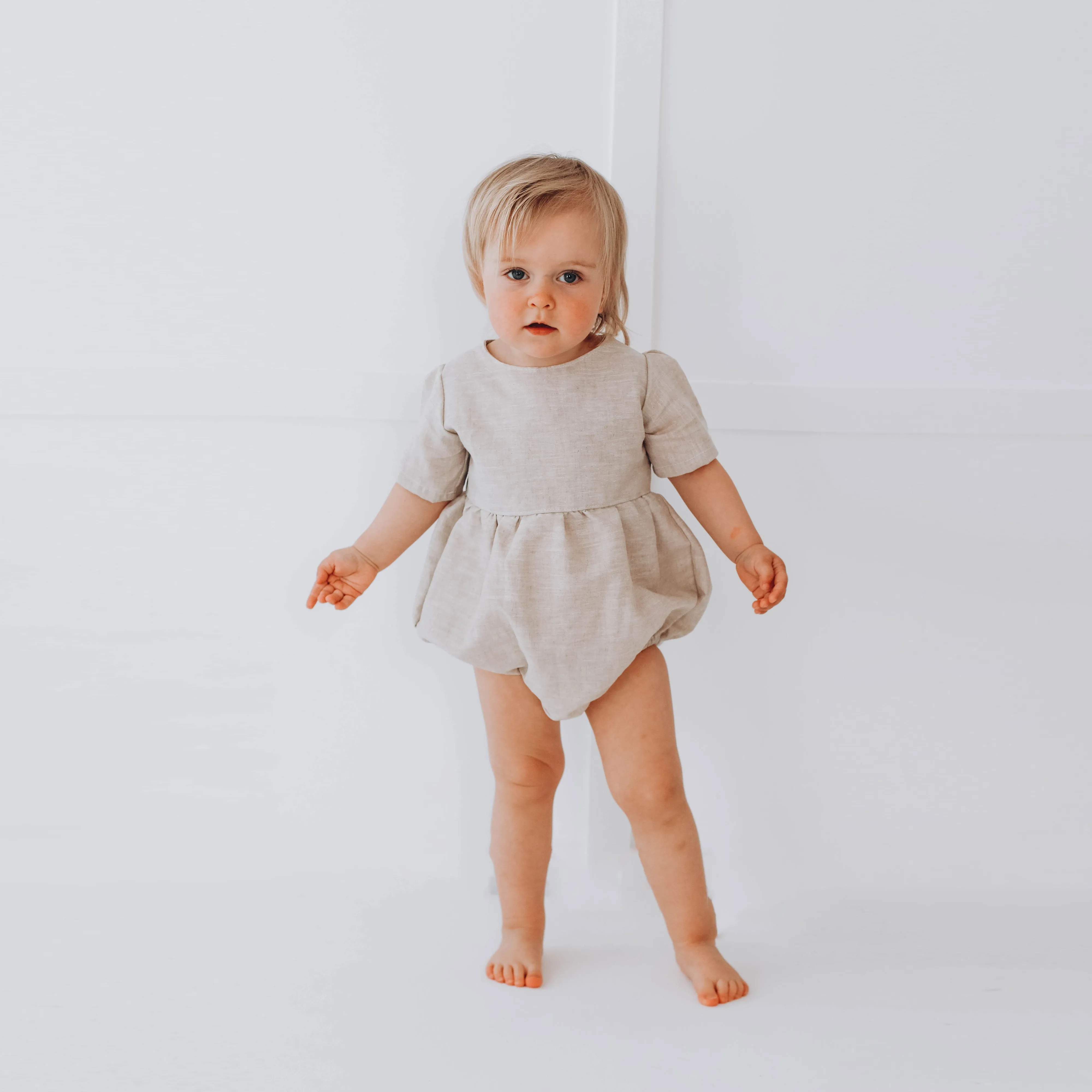 Linen romper with short sleeves