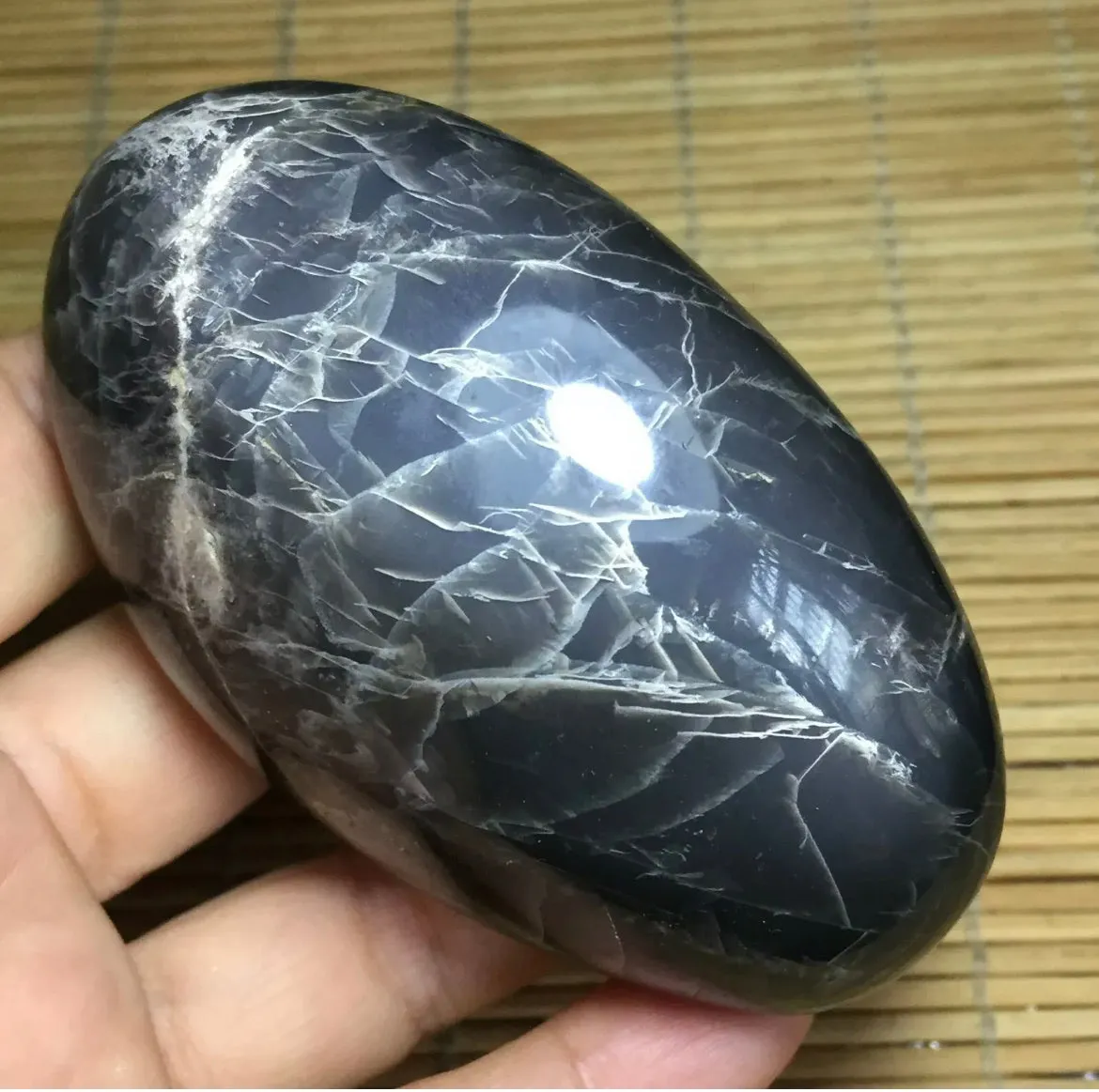 Natural grey moonstone healing palm stone